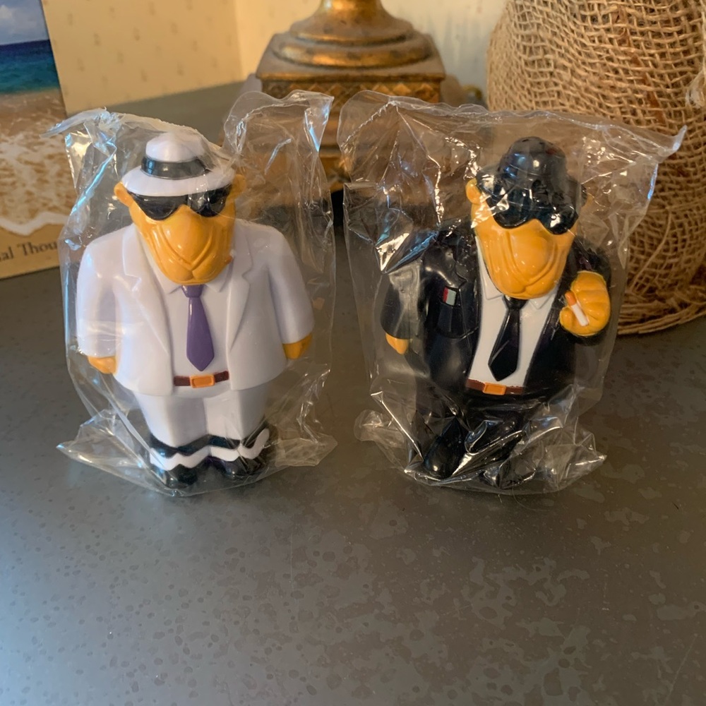 A pair of 1993 VINTAGE, NEW SEALED IN PLASTIC smoking JOE CAMEL salt and pepper.